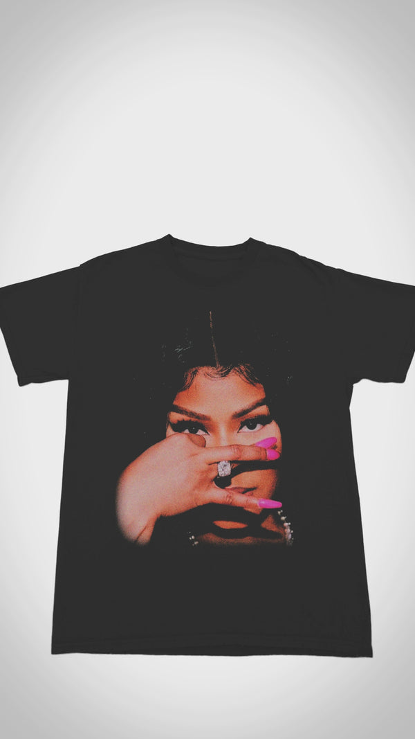 Official Nicki Minaj 'Pink Friday 2' T-shirt - Close-up video shows ultra-soft cotton, vibrant 2023 tour graphics, and bedazzled 'Gag City' lettering for Barbz collectors.
