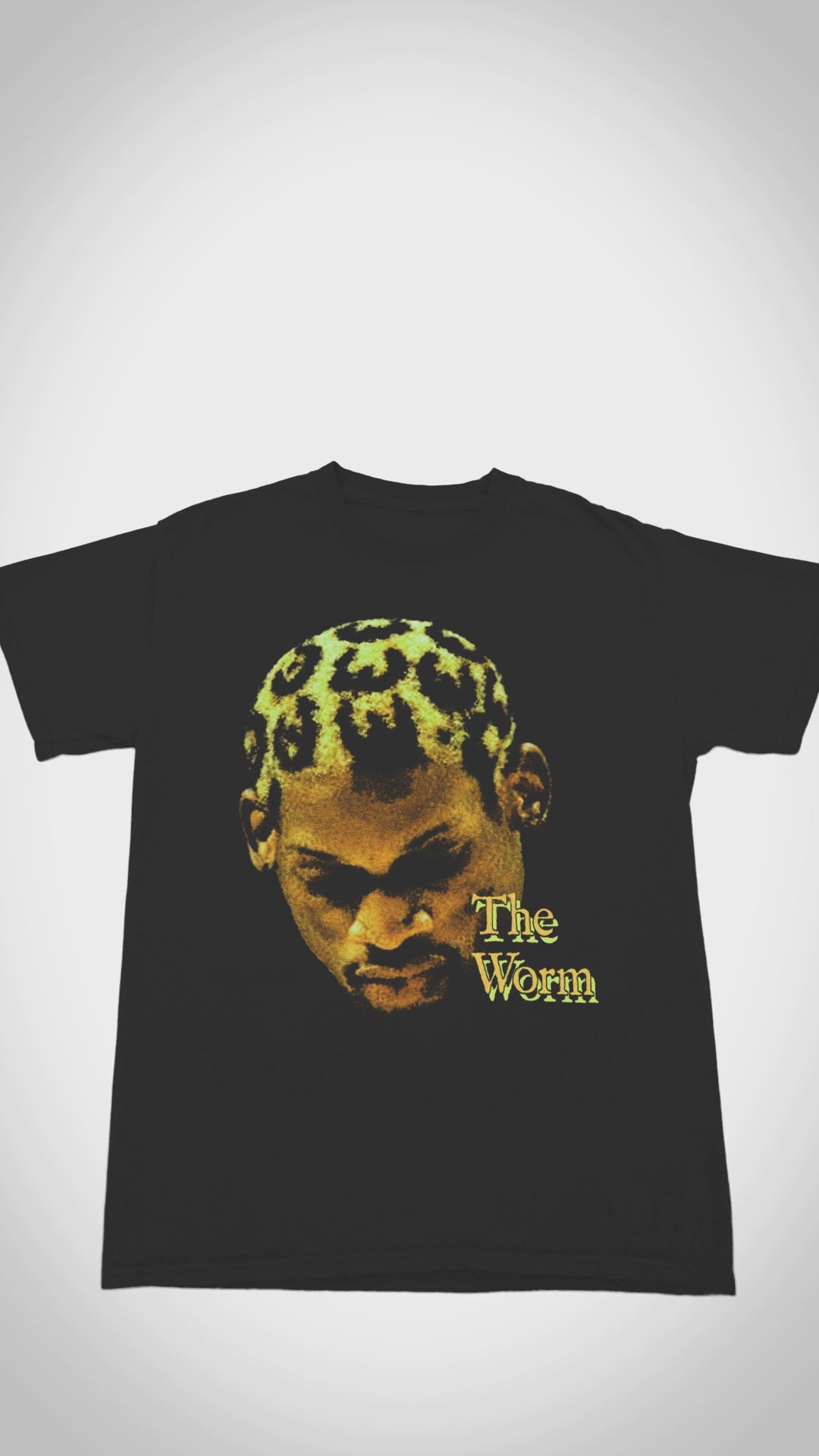 Dennis Rodman 'The Worm' graphic tee - Video close-up of iconic nickname design on soft, vintage-washed fabric for casual NBA fan wear.