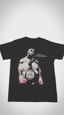 Vintage Mike Tyson 'Iron Mike' T-shirt - Close-up video shows heavyweight 100% cotton, distressed 1980s fight graphics, and authentic 'Baddest Man on the Planet' text for boxing collectors.