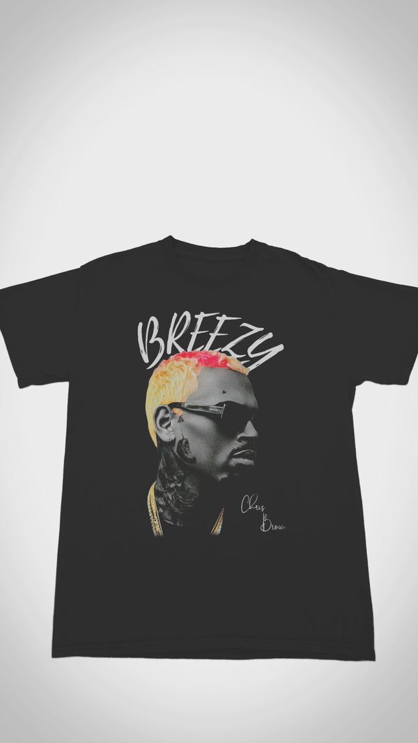 Official Chris Brown 'Breezy' album T-shirt - Close-up video shows ultra-soft tri-blend fabric, vibrant tour-inspired graphics, and reinforced stitching for concert-ready durability.