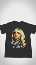 Close-up hover video of a Billie Eilish oversized tee - showcasing slouchy silhouette, distressed graphic print, and ultra-soft recycled cotton fabric in muted tones.